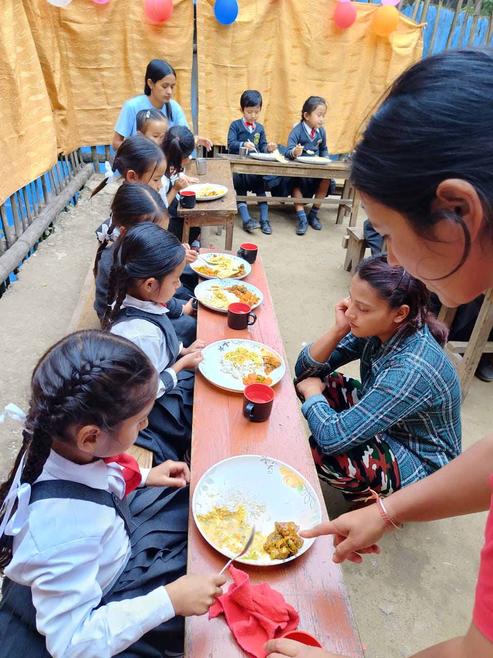 Meal time — the school feeds its community